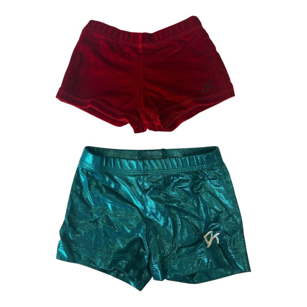 Two pairs gymnastics shorts size CS child small GK and Satara Leos brand
